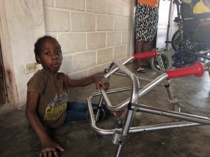 Child and walker HaitiChildren